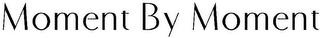 MOMENT BY MOMENT logo