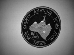 MON COUNTY AMATEUR RADIO CLUB 147.075 EST. 2012 logo