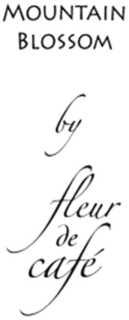 MOUNTAIN BLOSSOM BY FLEUR DE CAFÉ logo