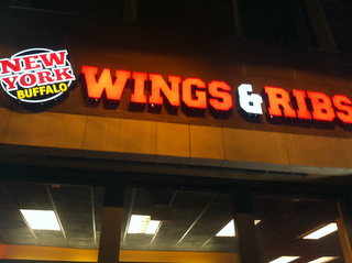 NEW YORK BUFFALO WINGS & RIBS logo