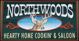 NORTHWOODS HEARTY HOME COOKIN' & SALOON logo