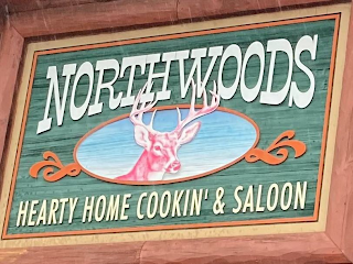 NORTHWOODS HEARTY HOME COOKIN' & SALOON logo