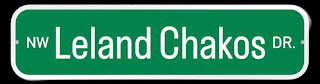 NW LELAND CHAKOS DR logo