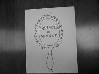 OBJECTS IN MIRROR logo