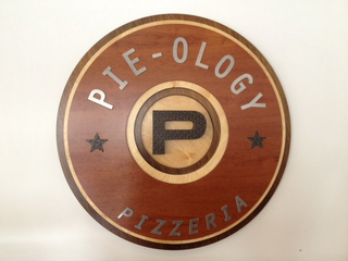 PIE-OLOGY P PIZZERIA logo