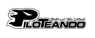 PILOTEANDO BEHIND THE WHEEL logo