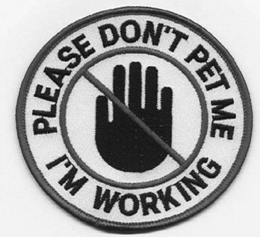 PLEASE DON'T PET ME - I'M WORKING logo