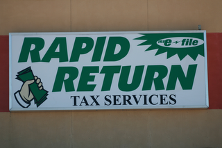 RAPID RETURN TAX SERVICES IRS E FILE logo