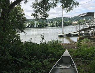 RIVERBANK PROPERTIES logo