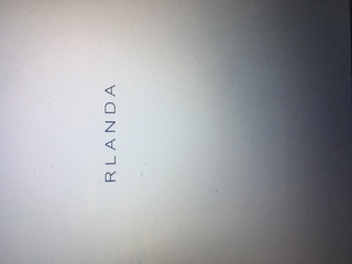 RLANDA logo