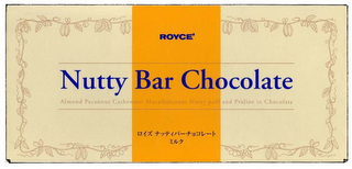 ROYCE' NUTTY BAR CHOCOLATE ALMOND PECANNUT CASHEWNUT MACADAMIANUT NUTTY PUFF AND PRALINE IN CHOCOLATE logo