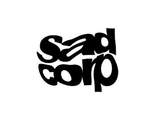 SAD CORP logo