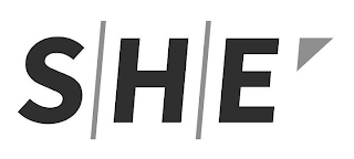 SHE logo