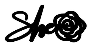 SHE logo