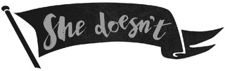 SHE DOESN'T logo