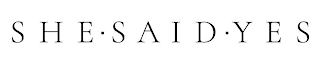 SHE · SAID · YES logo
