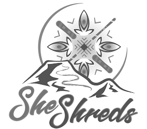SHE SHREDS logo