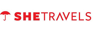 SHE TRAVELS logo