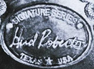 SIGNATURE SERIES HUD ROBERTS TEXAS USA logo