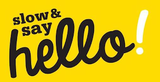 SLOW & SAY HELLO! logo