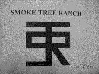 SMOKE TREE RANCH logo