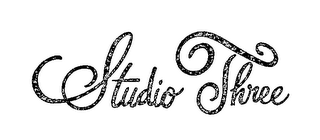 STUDIO THREE logo