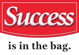 SUCCESS IS IN THE BAG. logo
