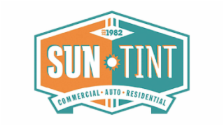 SUN TINT COMMERCIAL ∙ AUTO ∙ RESIDENTIAL EST 1982 logo