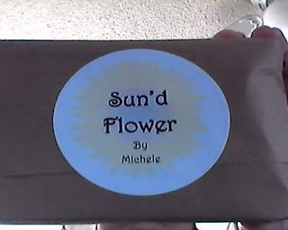 SUN'D FLOWER BY MICHELE logo