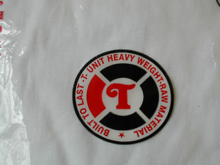 T BUILT TO LAST -T- UNIT HEAVY WEIGHT - RAW MATERIAL logo