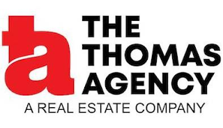 TA THE THOMAS AGENCY A REAL ESTATE COMPANY logo
