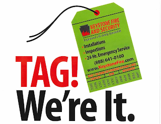 TAG! WE'RE IT. KEYSTONE FIRE AND SECURITY ENGINEERED LIFE SAFETY SPECIALISTS INSTALLATIONS INSPECTIONS 24-HR. EMERGENCY SERVICE (888) 641-0100 WWW.KEYSTONEFIRE.COM VOID 1 YEAR FROM MO PUNCHED SYSTEMS 6 MOS SERVICED NEW RECHARGED JAN FEB MAR APRIL MAY JUNE JULY AUG SEPT OCT NOV DEC logo