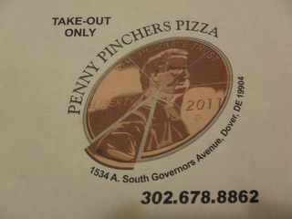 TAKE-OUT ONLY PENNY PINCHERS PIZZA. THE PIZZA WE TRUST LIBERTY 2011 1534 A. SOUTH GOVERNORS AVENUE, DOVER, DE 19904 301.678.8862 logo