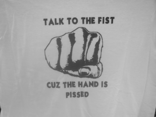 TALK TO THE FIST CUZ THE HAND IS PISSED logo