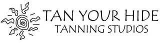 TAN YOUR HIDE TANNING STUDIOS logo