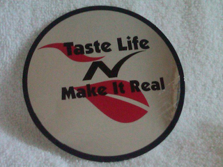 TASTE LIFE N MAKE IT REAL logo