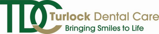 TDC TURLOCK DENTAL CARE BRINGING SMILES TO LIFE logo