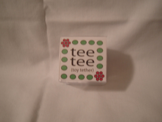 TEE TEE (TOY TETHER) logo