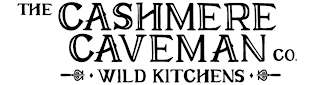THE CASHMERE CAVEMAN CO. WILD KITCHENS logo