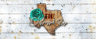 THE DISTRESSED ROSE logo