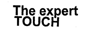 THE EXPERT TOUCH logo