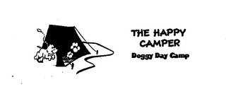 THE HAPPY CAMPER DOGGY DAY CAMP logo