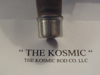 "THE KOSMIC" THE KOSMIC ROD CO. LLC logo