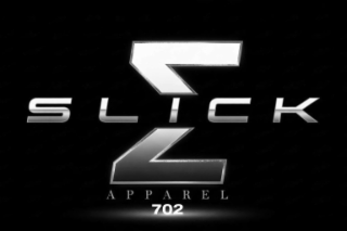 THE MARK CONSISTS OF THE STYLIZED WORDING “SLICK APPAREL 702” WITH A LARGE STYLIZED GREEK LETTER SIGMA CENTERED BETWEEN THE WORDS “SLICK” AND “APPAREL.” THE ELEMENTS OF THE MARK APPEAR IN A METALLIC GRADIENT DESIGN AGAINST A DARK BACKGROUND. logo