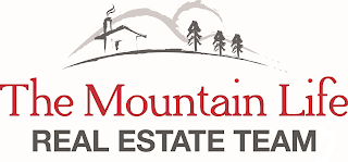 THE MOUNTAIN LIFE REAL ESTATE TEAM logo