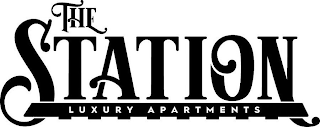 THE STATION LUXURY APARTMENTS logo