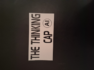 THE THINKING CAP AI logo