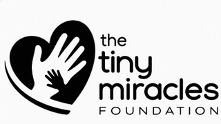 THE TINY MIRACLES FOUNDATION logo