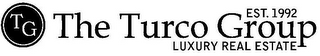 THE TURCO GROUP LUXURY REAL ESTATE EST.1992 TG logo