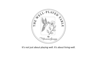 THE WELL-PLAYED TABLE BY MAMMAHJONGG IT'S NOT JUST ABOUT PLAYING WELL. IT'S ABOUT LIVING WELL. logo